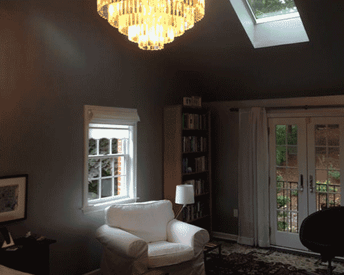 Master Bedroom – Sitting area with skylight and doors to French balcony.